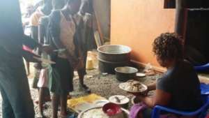 CHILDREN ENJOYING lunch
