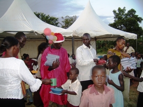 Distribution of Books,pens ,pencils, plate & cups