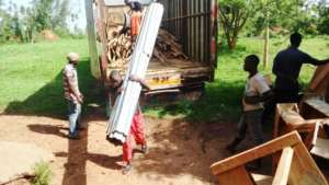 lOADING SCHOOL MATERIALS FROM OLD TO NEW SITE