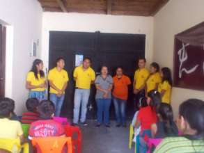 The Isa Students speaking with the moms and kids