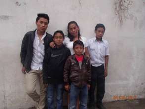 Eric with Mario, Marvin and Anthony at our school
