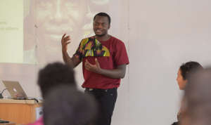 Alloysius Attah of Farmerline speaking in class.