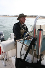 Ron Eby driving Nereis: our boat