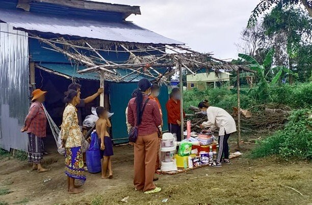 Our staff in Battambang province on a house visit.