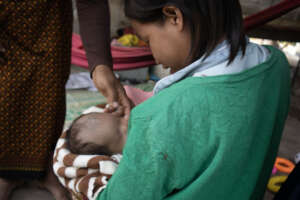 A postnatal visit with mum and baby