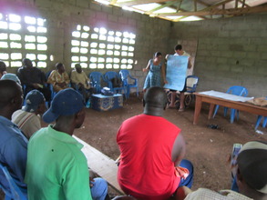 Ekombe Tradtional council listen to GCI staff