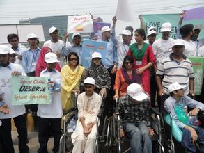 Awareness walk by volunteers and special children