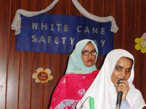 Students performing on the white cane day