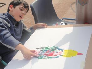 A special Kid doing art work