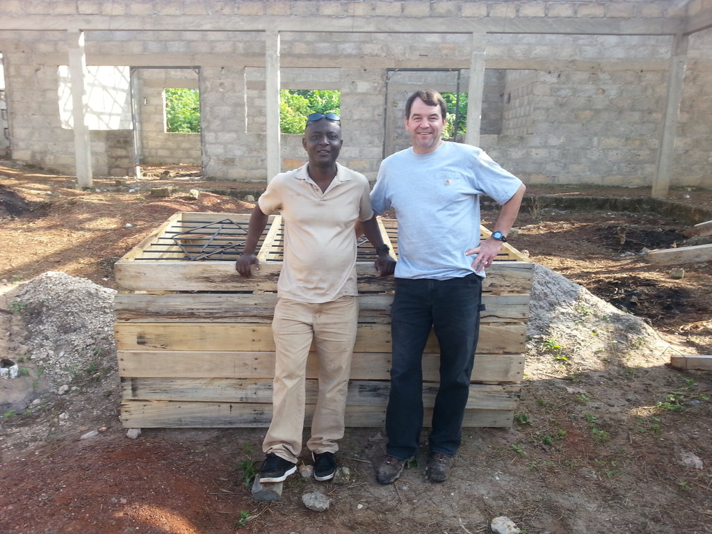 Steve and Kwasi In Ghana working on the project