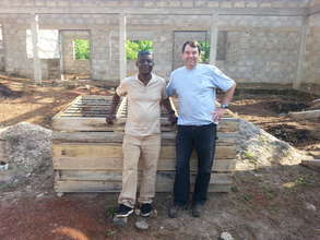 Steve and Kwasi In Ghana working on the project