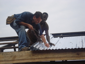 Steve Prater roofing the building