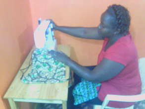 Peninna - Our coordinator making re-usable pads