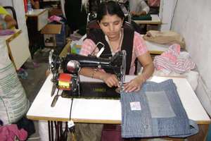 Converting torn jeans and trousers into bags