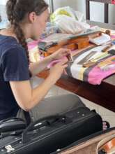 Repairing our violins!