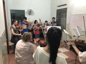 Summer volunteers teaching