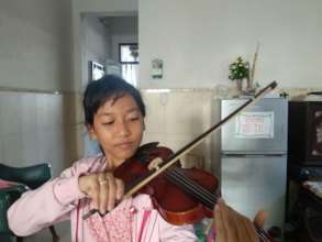Tran and her new violin