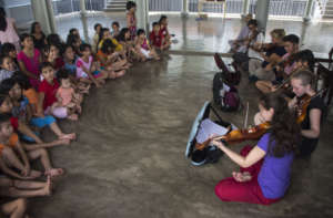Playing music for kids in a local orphanage