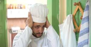 Ahmad gets ready to cook