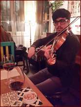 Hovsep performing at a local cafe for Valentine's