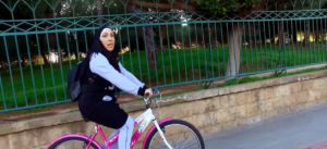 Iman promotes outdoor sports by riding her bike
