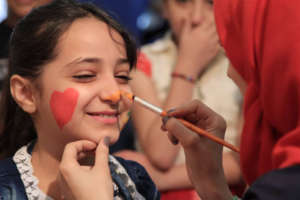 A precious smile on a child's face, by Hussein!