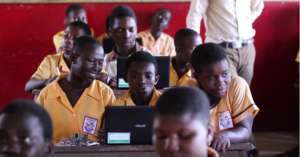 Computer class - three children per laptop!