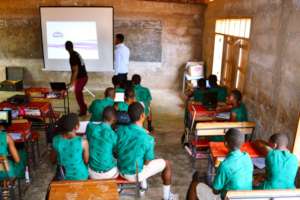 Librarian and teacher at work in Volta Region.