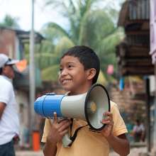A young boy in one of the neighborhoods