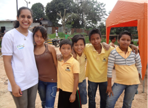 A GROW intern with some of the youth