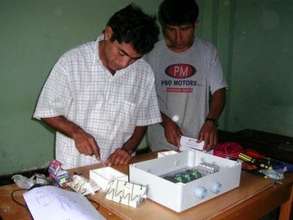 Community members wiring the school