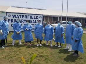 Clinic Staff with gear to protect from COVID-19