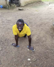 Remarkable Man Moving with Flip-Flops on Hands