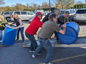 Loading Barrels on the Truck
