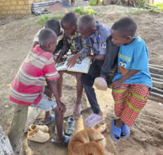 Boys Reading a Book from Barrels of Love