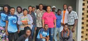 Nobel Laureate, Leymah Gbowee (pink shirt)
