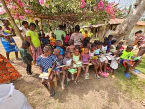 Beautiful children with beautiful flowering trees.