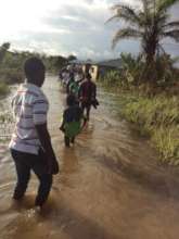 Community Health Workers on flooded streets