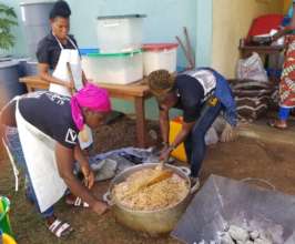 Our Cooks preparing to feed the children