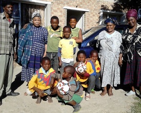 Soup Kitchen staff and kids
