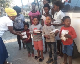 Handing out food staples