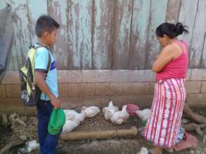 Basilio learns how this family raises its poultry