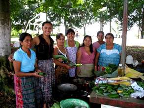 A cooking team at their "prep table" in the park