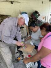 Teaching team members how to test water quality