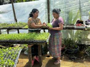 Carmelina and a Program beneficiary in Santa Maria