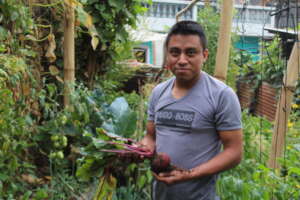 Proud of his garden's success