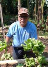 Vicente with a beautiful head of lettuce