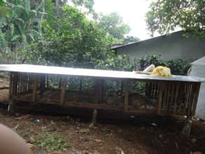 Housing for rabbits, to add vital protein to diets