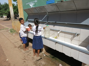 jugs or cupped hands - both work for clean water!