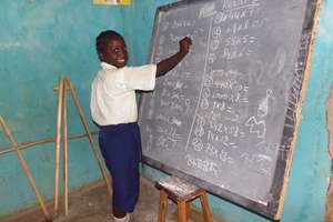 Primary 4 student practices her math problems
